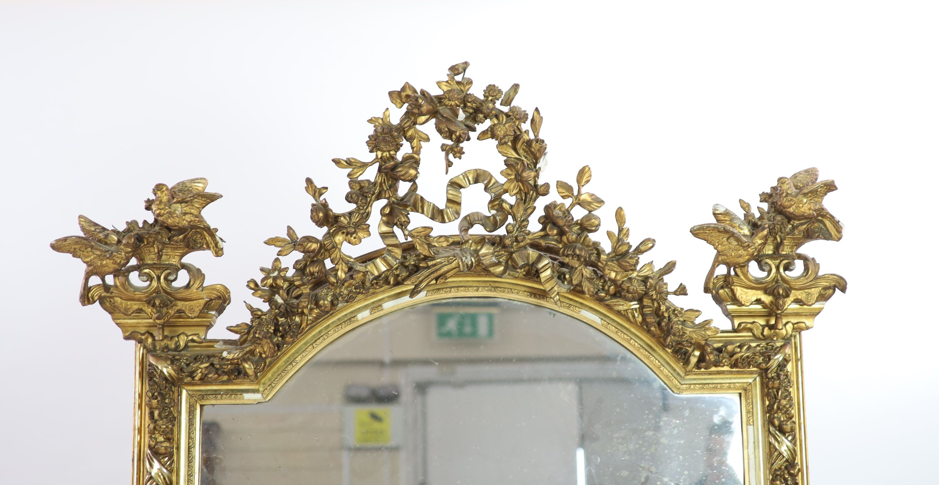 A late 19th century French gilt gesso overmantel W.122cm H.204cm